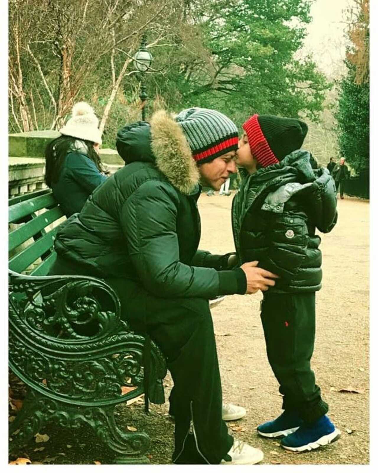SRK and AbRam are indeed the cutest father-son pair. Here the little one is seen giving his father a kiss